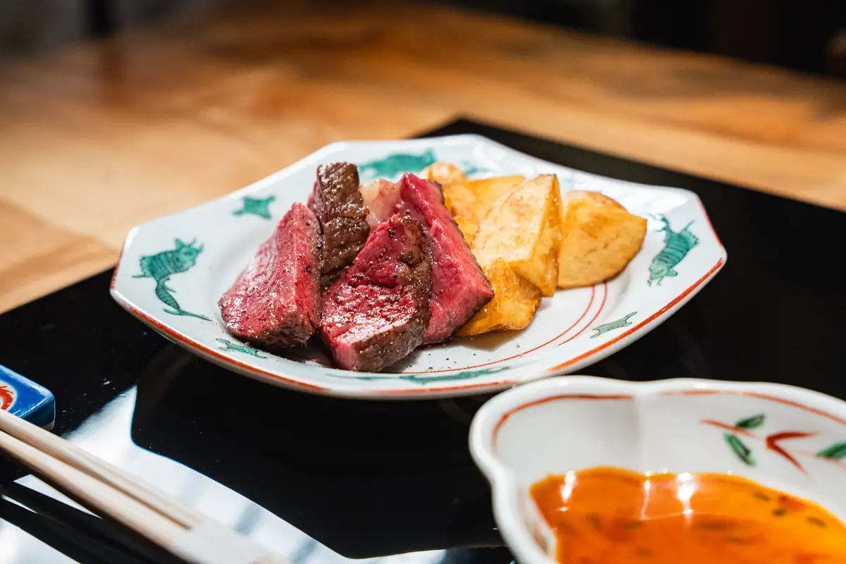 Charcoal-grilled Kobe beef served at a counter in Kobe